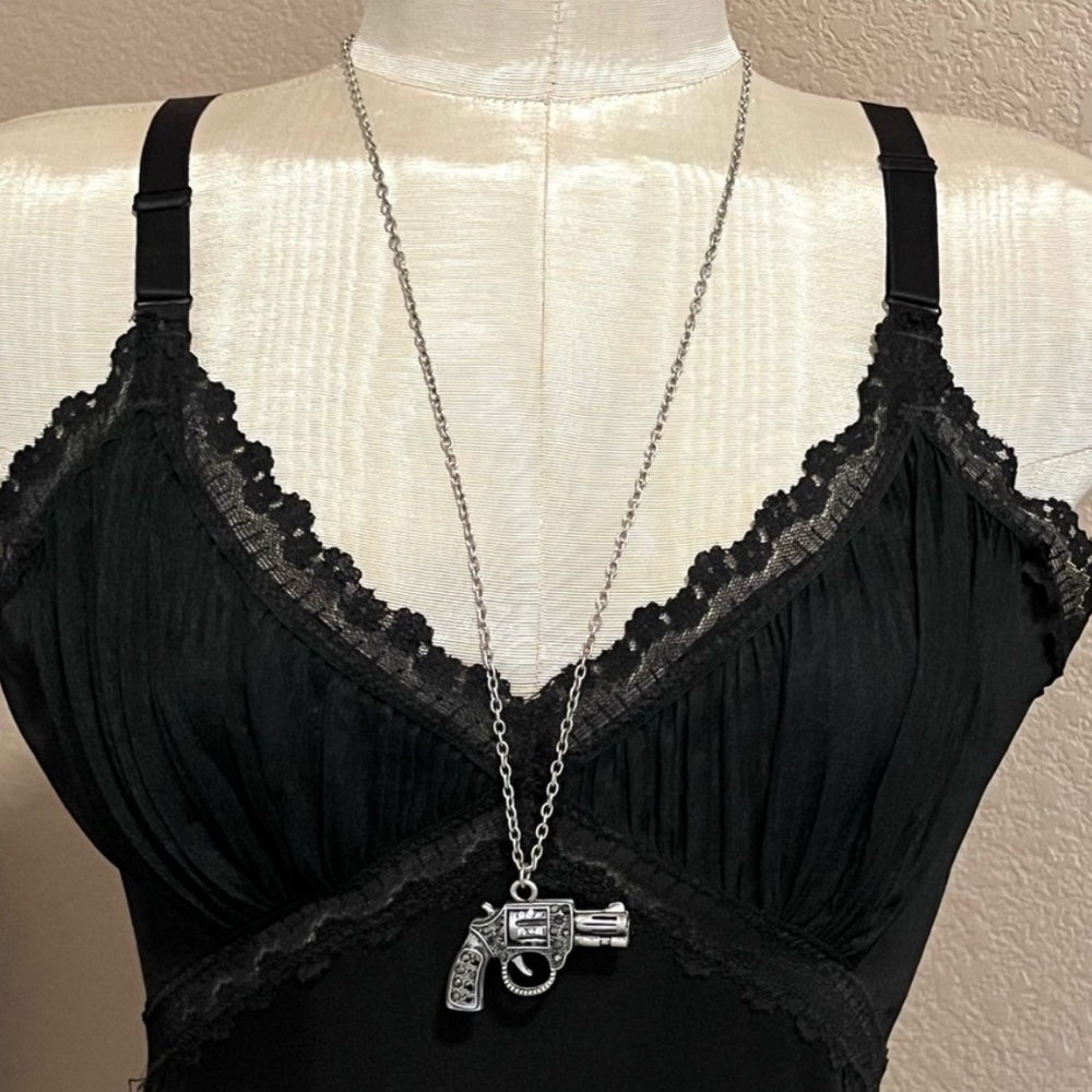 Silver tone and Marcasite Revolver Necklace